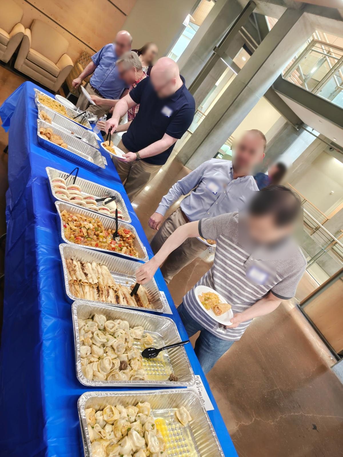 Guests serving themselves from a Himalayan catering buffet