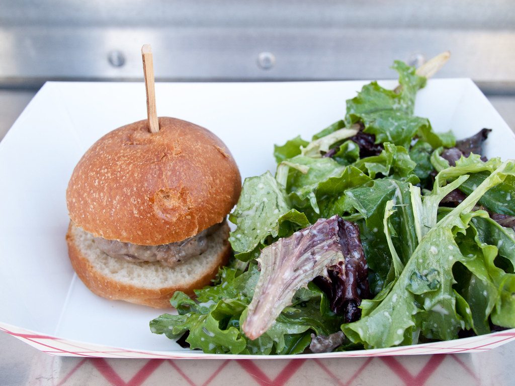 Lamb sliders with lettuce, tomato and pickled onions